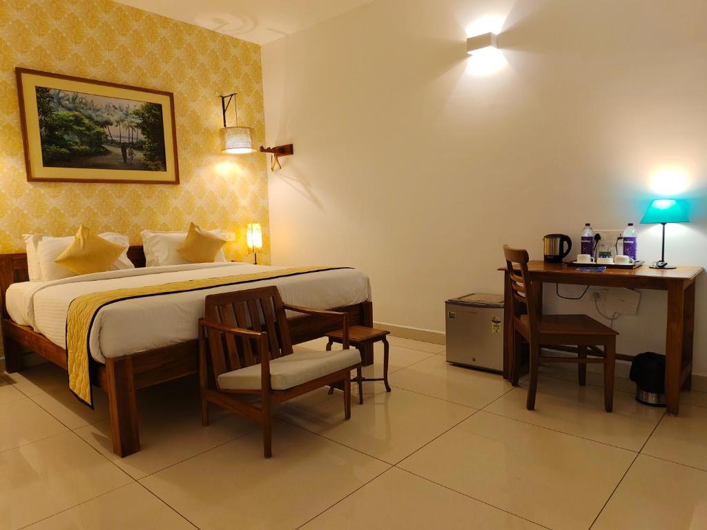 Postel nebo postele na pokoji v ubytování Hotel Aura by Woco Stays