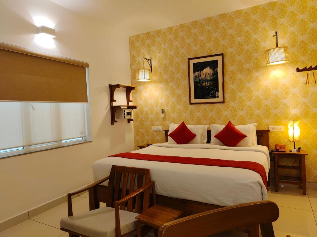 Postel nebo postele na pokoji v ubytování Hotel Aura by Woco Stays
