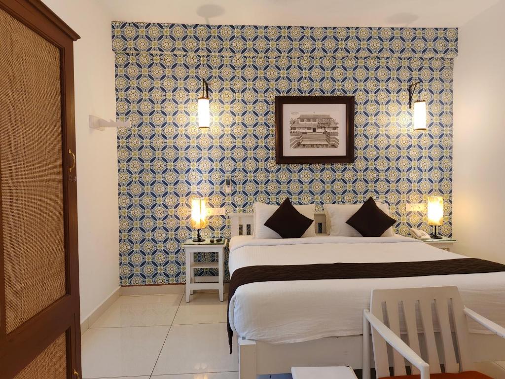 Postel nebo postele na pokoji v ubytování Hotel Aura by Woco Stays