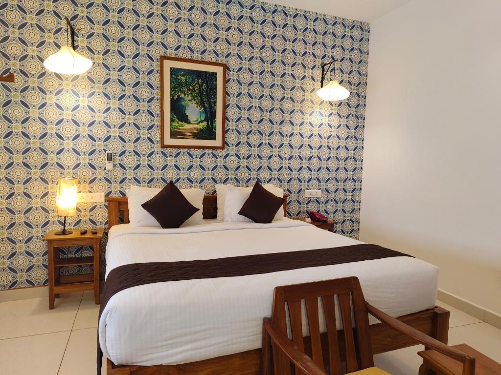Postel nebo postele na pokoji v ubytování Hotel Aura by Woco Stays