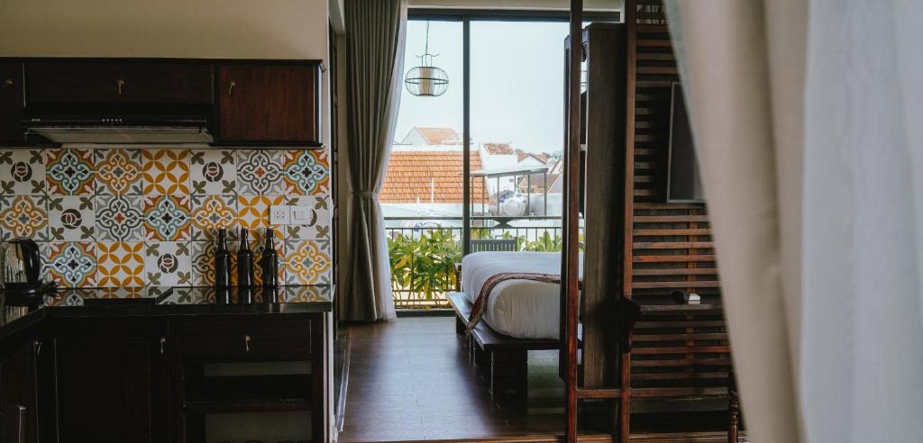 Posezení v ubytování Hoi An Ti Hon House