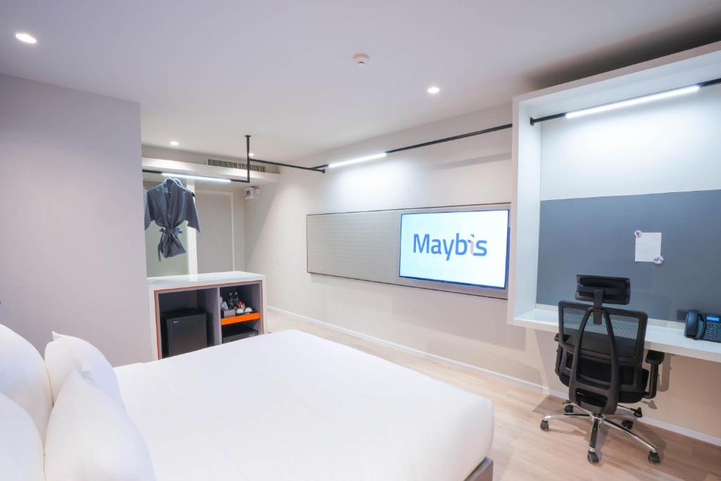 TV a/nebo společenská místnost v ubytování Maybis Hotel