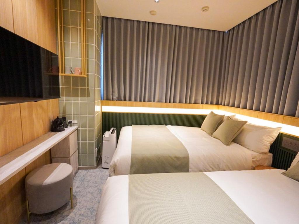 TV a/nebo společenská místnost v ubytování The GALA Hotel Umeda