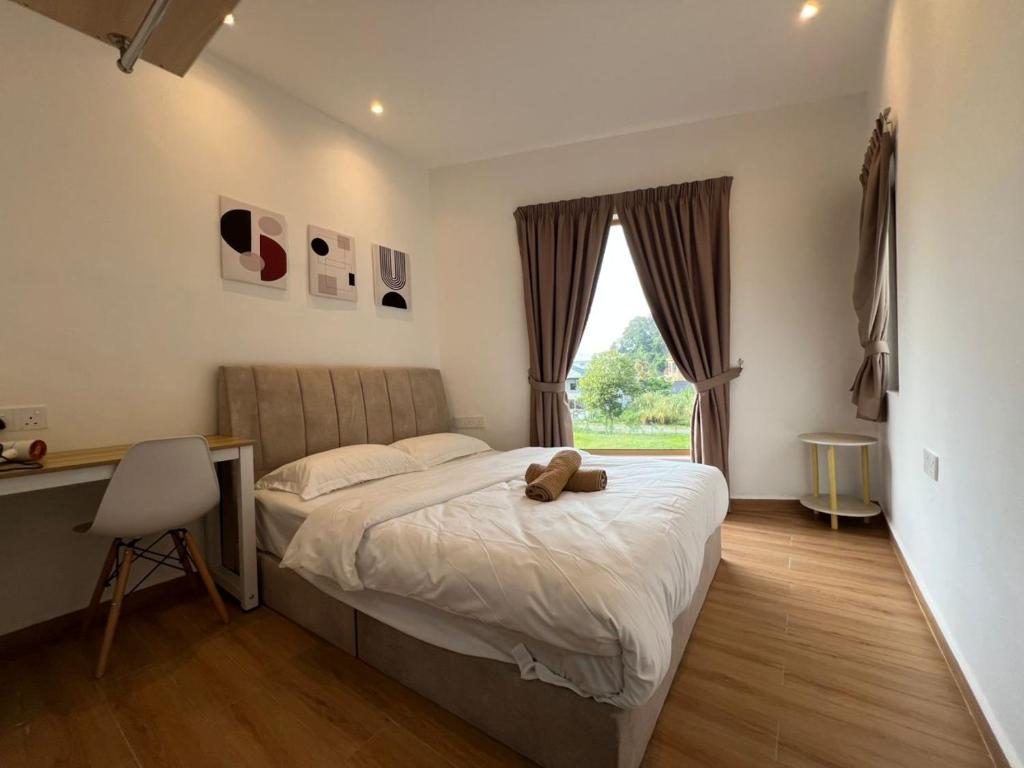 Postel nebo postele na pokoji v ubytování Hillview Ipoh