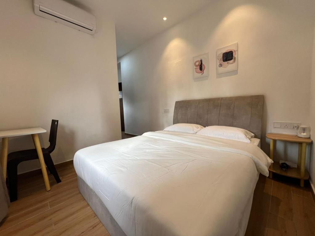 Postel nebo postele na pokoji v ubytování Hillview Ipoh