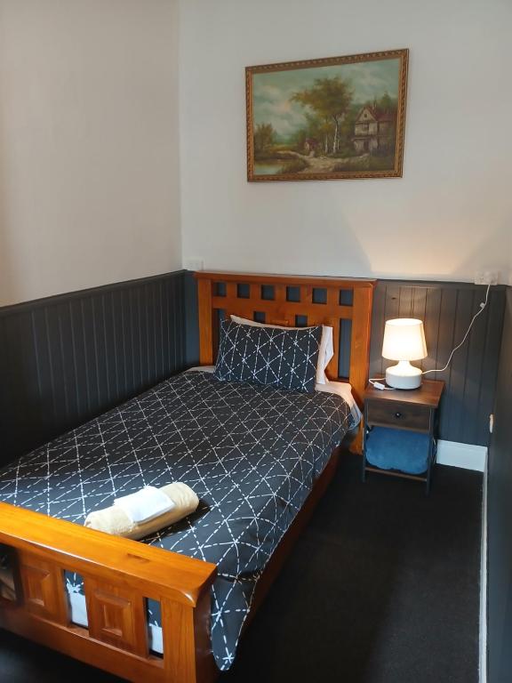 Postel nebo postele na pokoji v ubytování Hunters Hotel