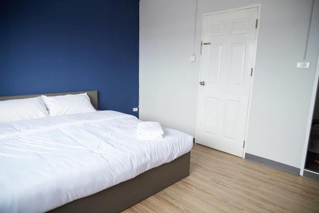 Postel nebo postele na pokoji v ubytování Blue26