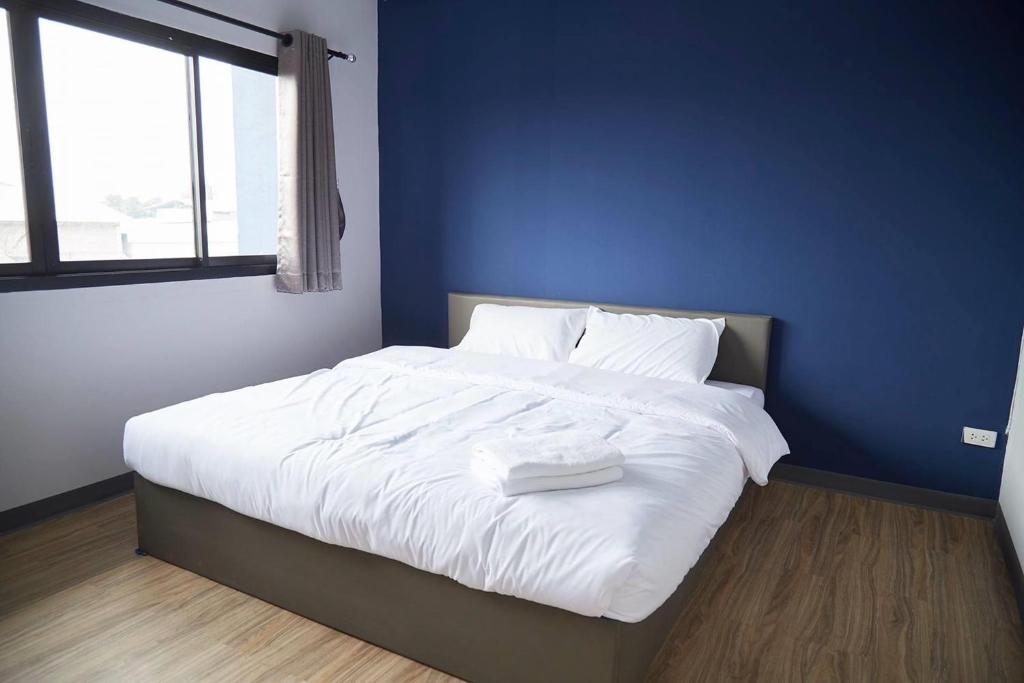 Postel nebo postele na pokoji v ubytování Blue26