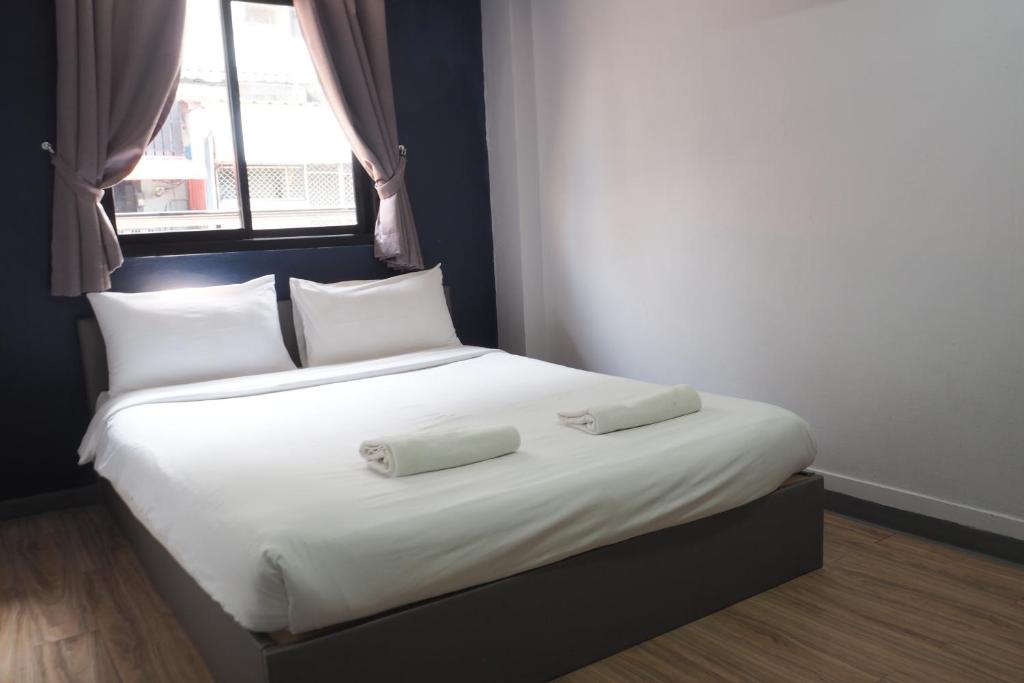 Postel nebo postele na pokoji v ubytování Blue26