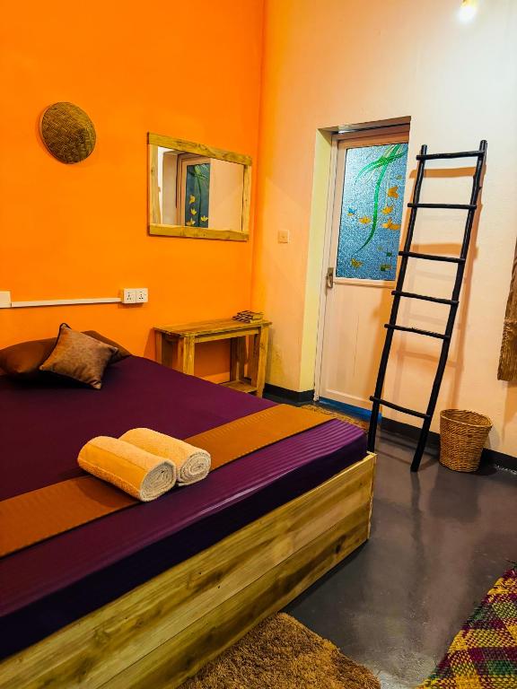 Postel nebo postele na pokoji v ubytování Dreamy Hostel Arugambay