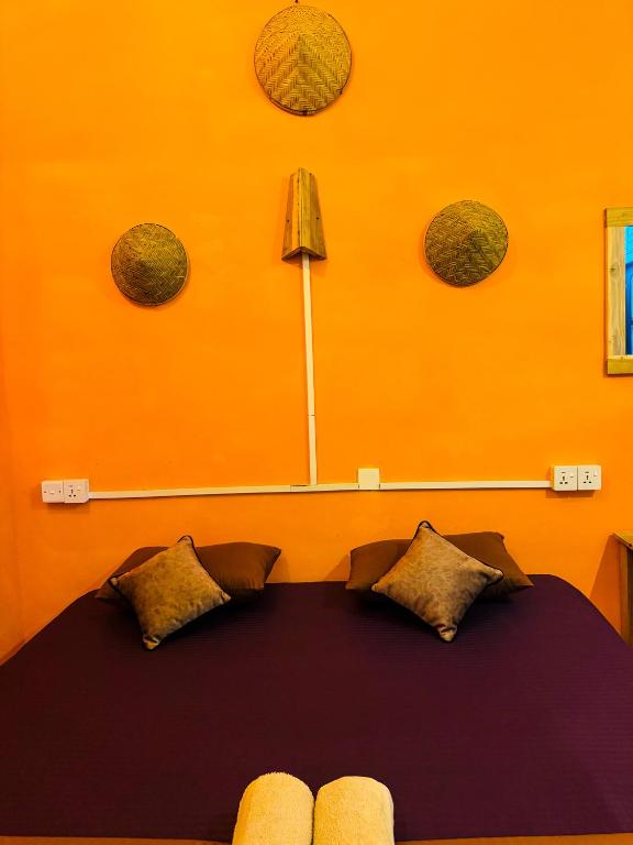 Postel nebo postele na pokoji v ubytování Dreamy Hostel Arugambay