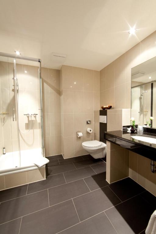 Koupelna v ubytování Seehotel
