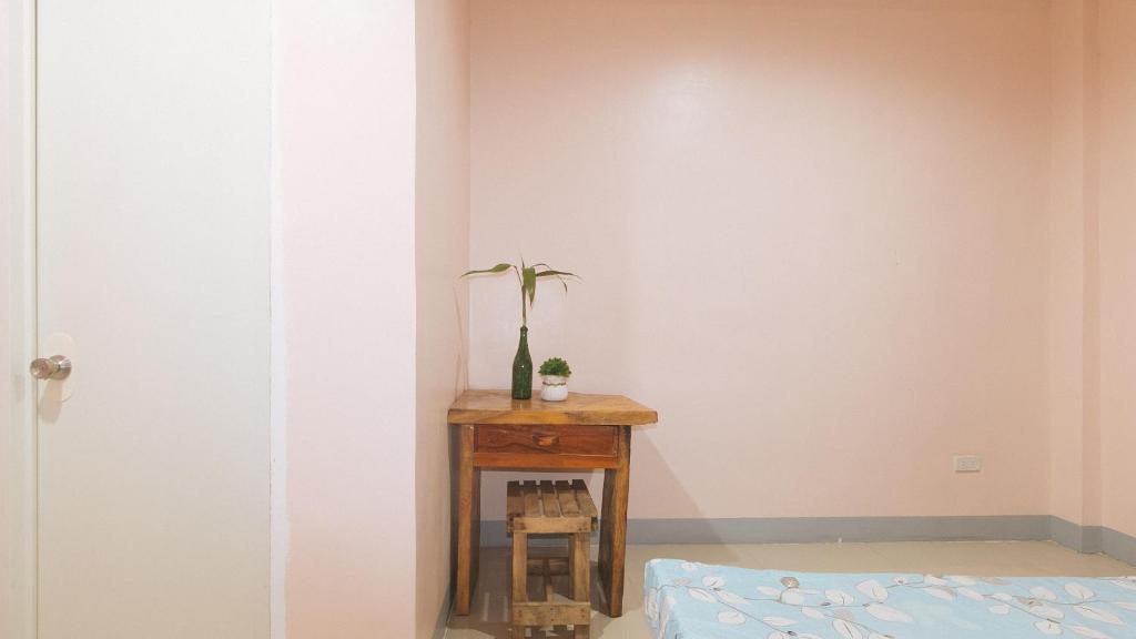 Postel nebo postele na pokoji v ubytování Bello Vue Apartelle