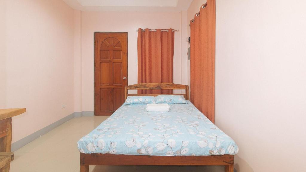 Postel nebo postele na pokoji v ubytování Bello Vue Apartelle
