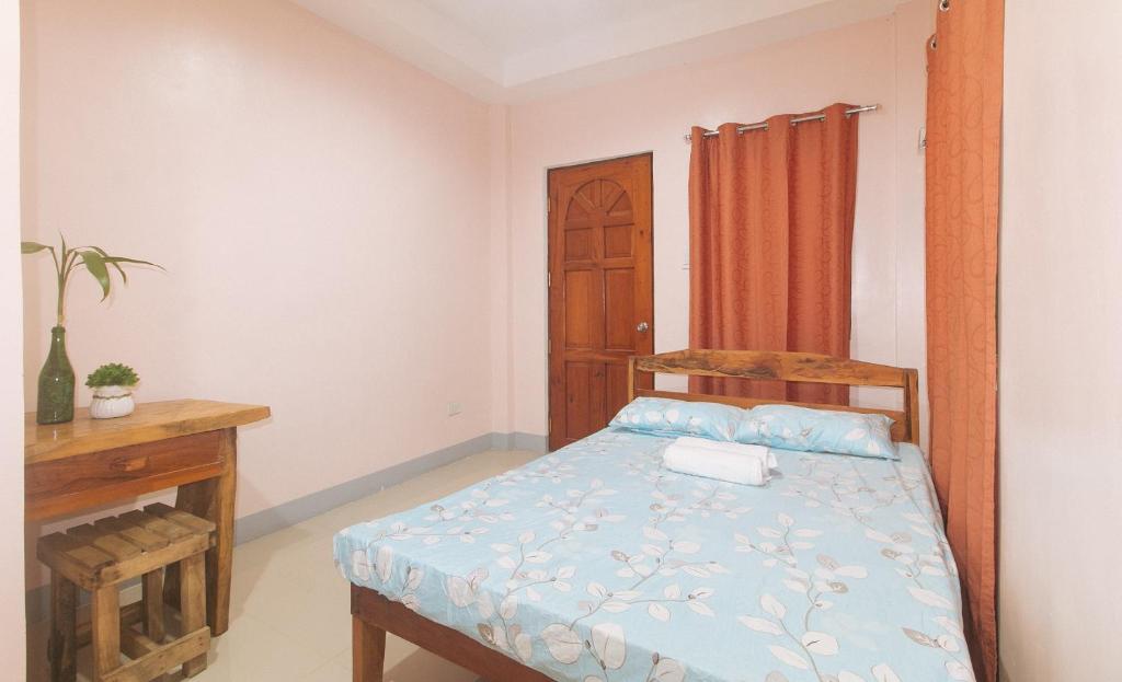 Postel nebo postele na pokoji v ubytování Bello Vue Apartelle