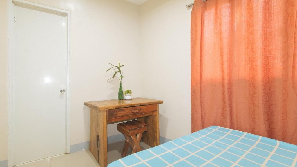 Postel nebo postele na pokoji v ubytování Bello Vue Apartelle