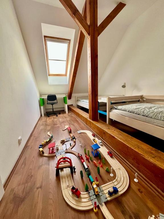 Postel nebo postele na pokoji v ubytování Apartmán Půda na jihu