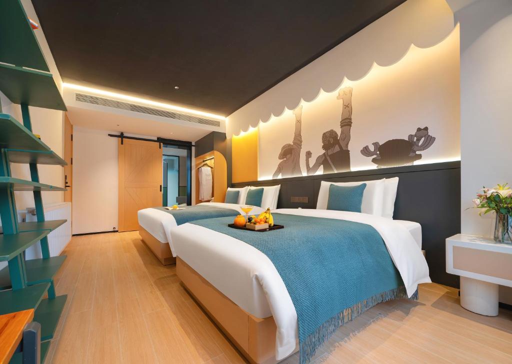 Postel nebo postele na pokoji v ubytování Zhangjiajie Brook Hotel