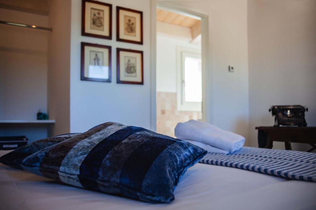 A bed or beds in a room at Audaces Resort