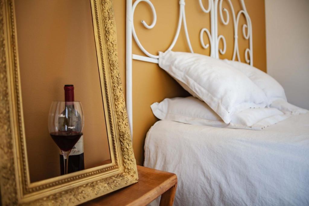 A bed or beds in a room at Audaces Resort