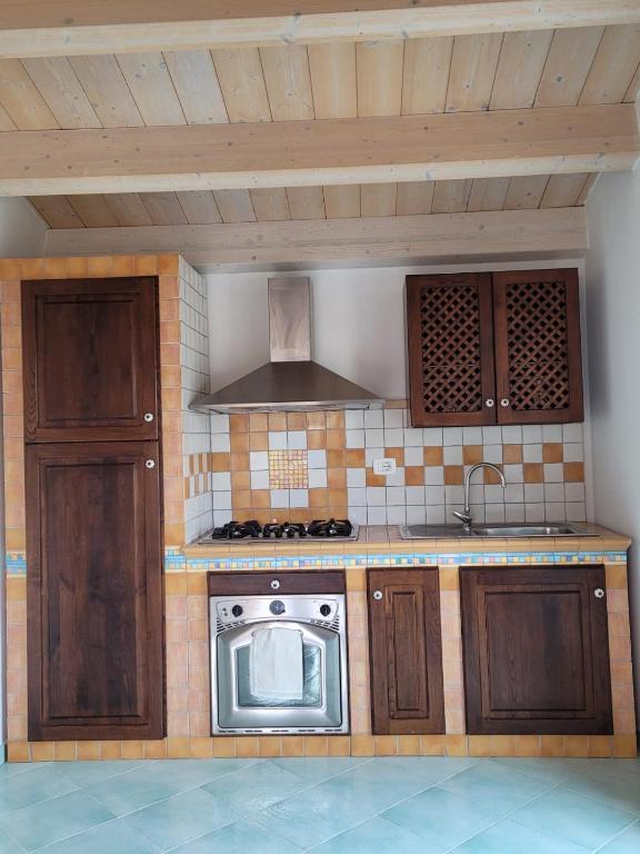 A kitchen or kitchenette at Audaces Resort