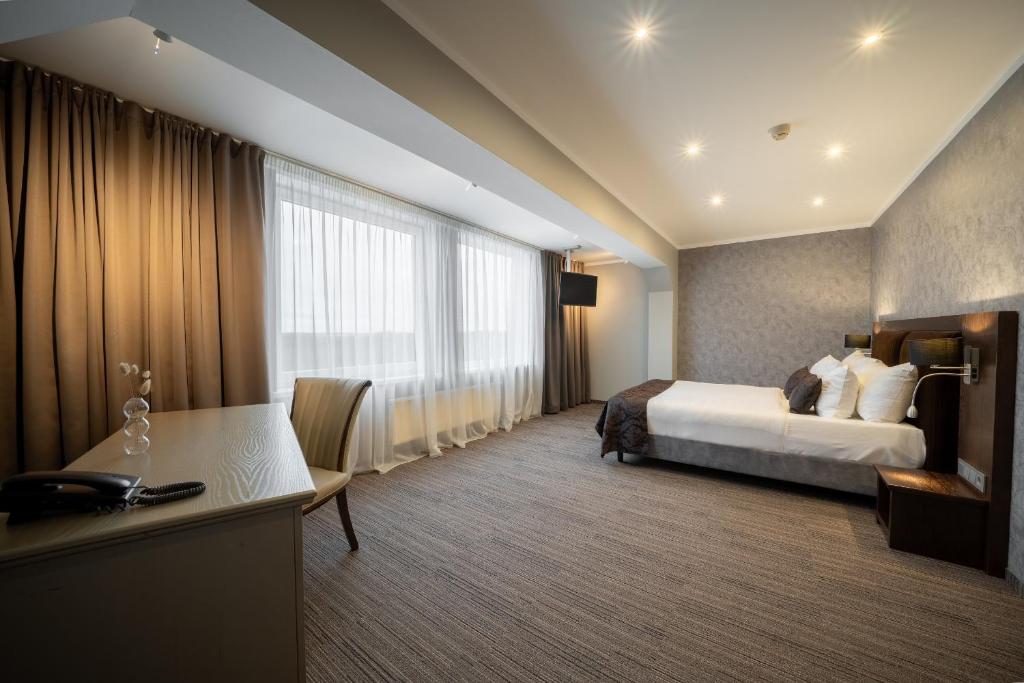 Gulta vai gultas numurā naktsmītnē Bellevue Park Hotel Riga with FREE Parking
