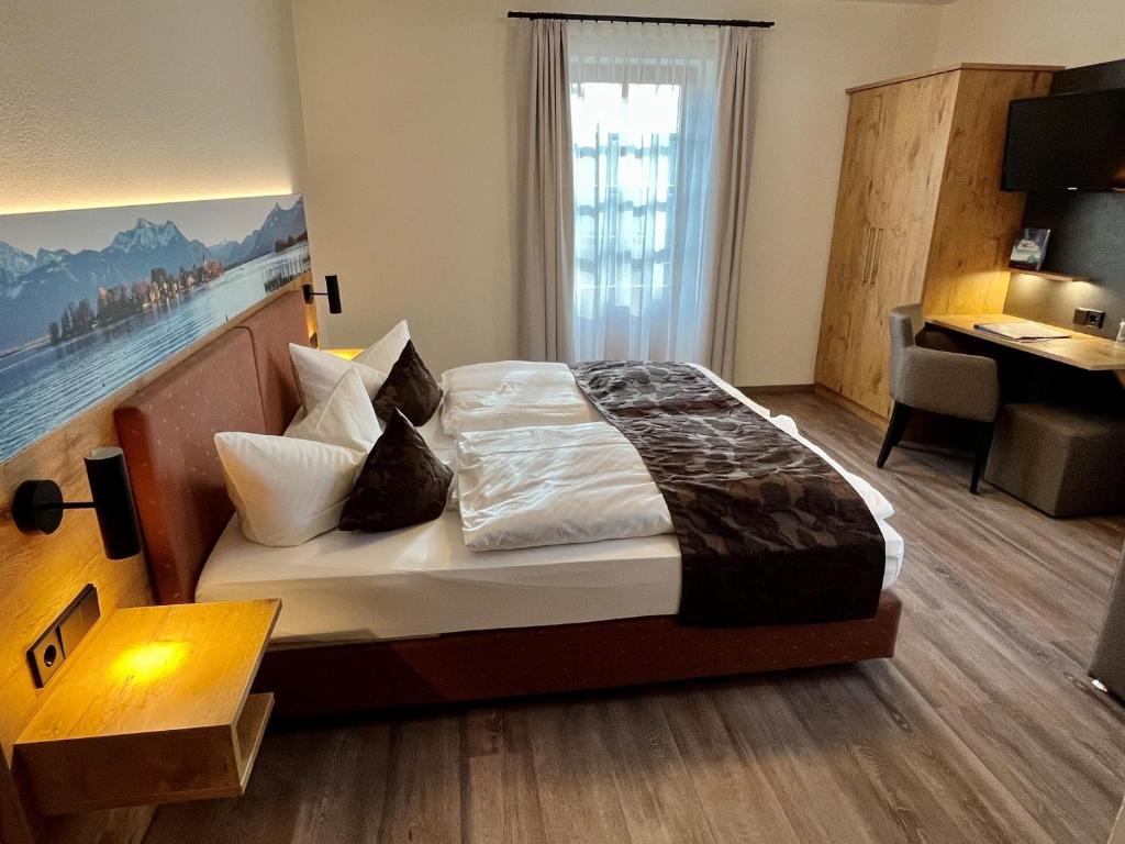 Postel nebo postele na pokoji v ubytování Hotel Oberwirt