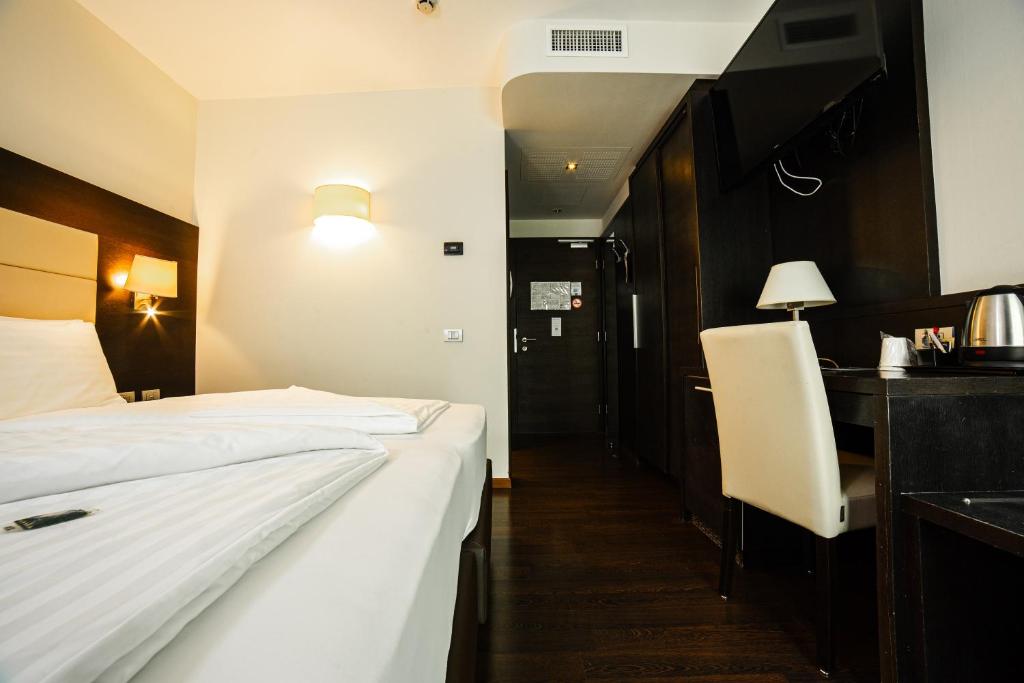 Postel nebo postele na pokoji v ubytování Best Western Hotel Adige