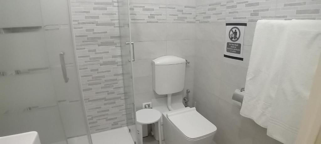 Koupelna v ubytování Titi Rooms