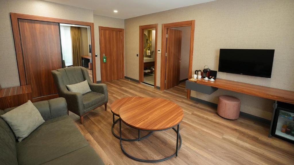 TV a/nebo společenská místnost v ubytování Hilas Thermal Resort Spa & Aquapark