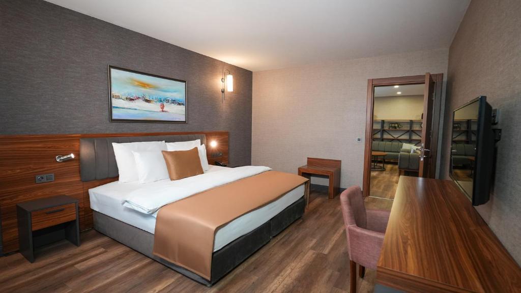 Postel nebo postele na pokoji v ubytování Hilas Thermal Resort Spa & Aquapark