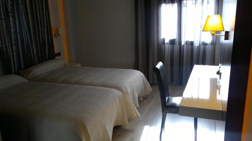 Postel nebo postele na pokoji v ubytování Hotel Las Terrazas & Suite