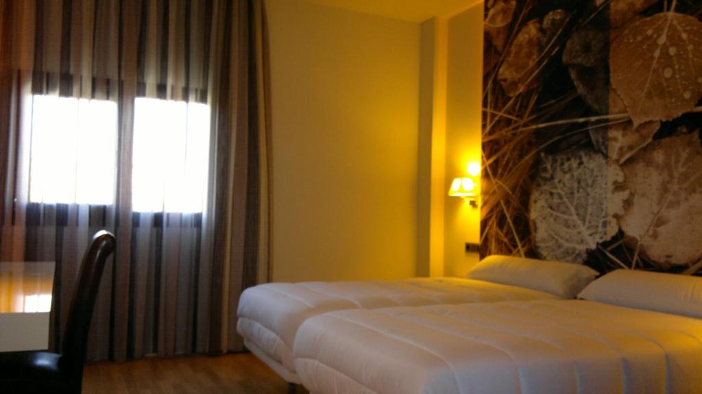 Postel nebo postele na pokoji v ubytování Hotel Las Terrazas & Suite