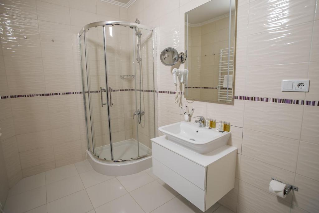 Koupelna v ubytování Rivoli Hotel