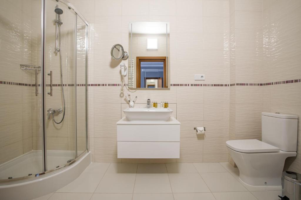 Koupelna v ubytování Rivoli Hotel
