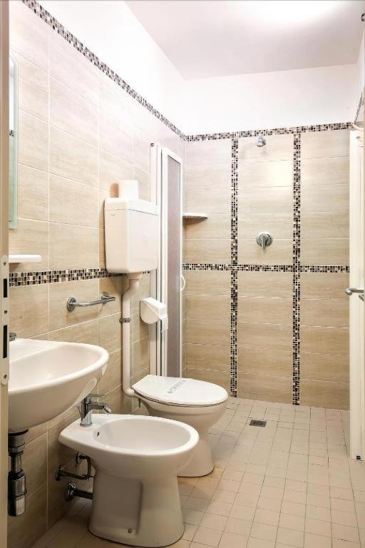 Koupelna v ubytování Hotel REX