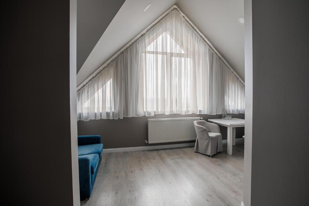 Posezení v ubytování Rivoli Hotel