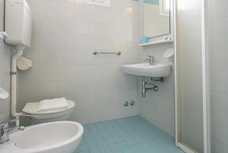 Koupelna v ubytování Hotel REX