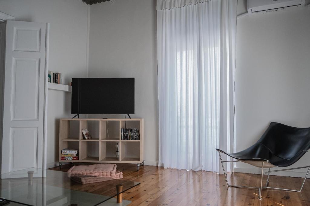 TV a/nebo společenská místnost v ubytování Casanova94 Guesthouse