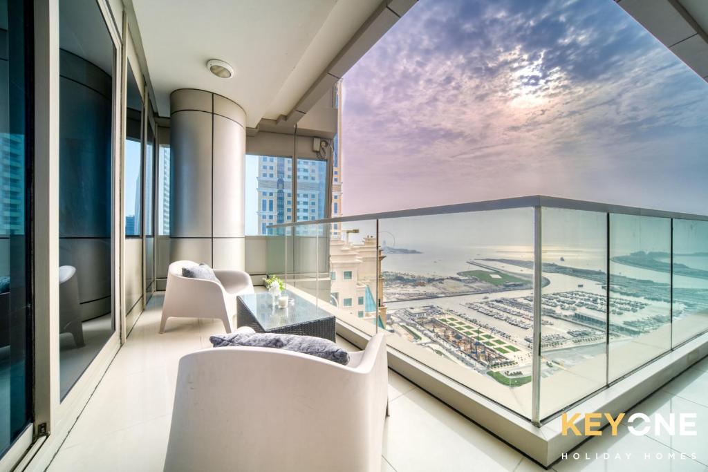 a balcony with a view of the ocean at Captivating Sky & Sea Views in Two Bedroom Suite in Dubai