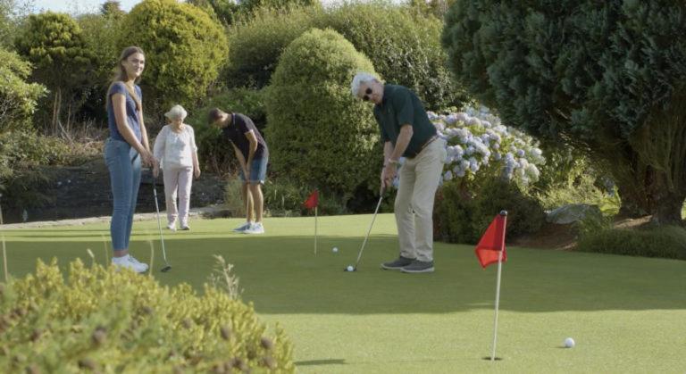 a group of people playing a game of golf at Bowood Park Hotel in Camelford