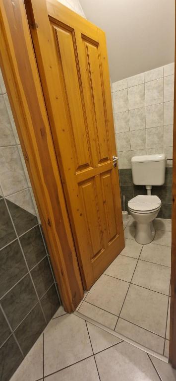 Koupelna v ubytování Hotel Patonai