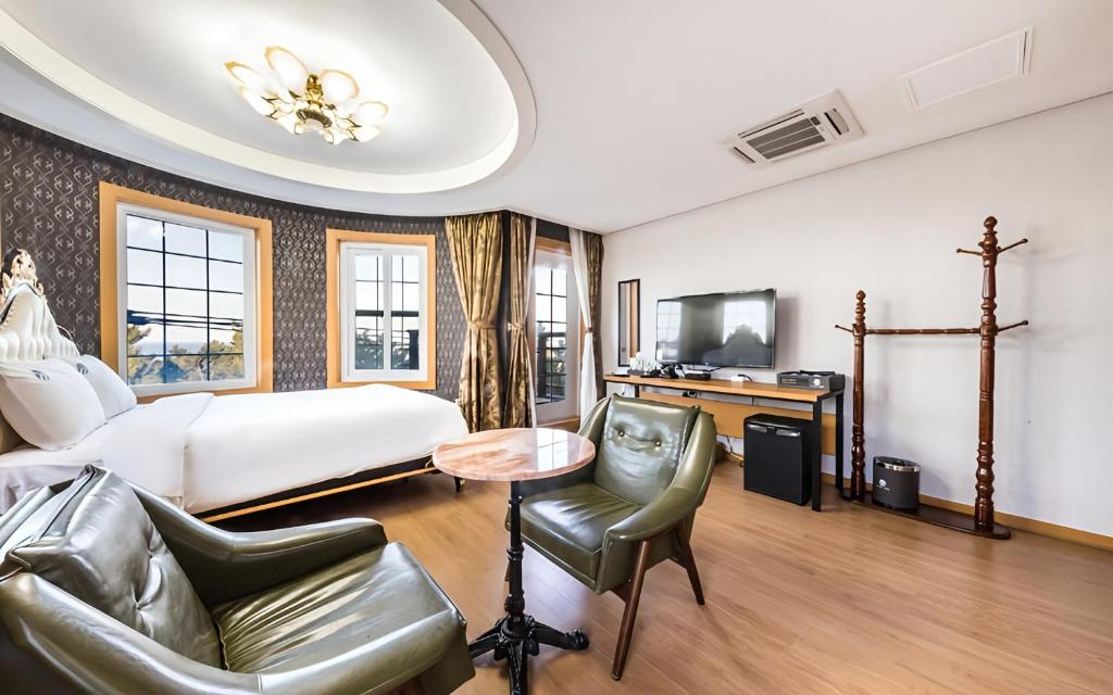TV a/nebo společenská místnost v ubytování Lamer Hotel