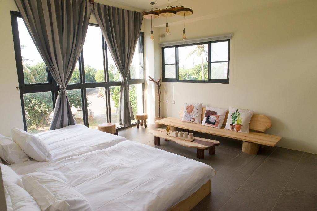 Postel nebo postele na pokoji v ubytování 白沙35 kenting Baisha 35