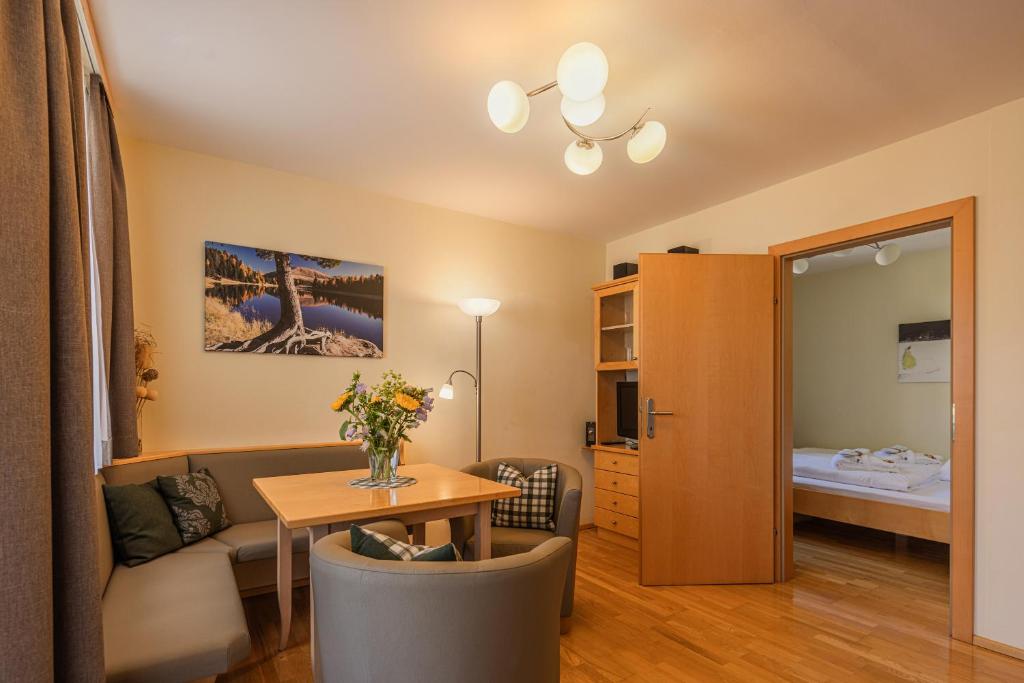 Postel nebo postele na pokoji v ubytování Alpine Spa Residence