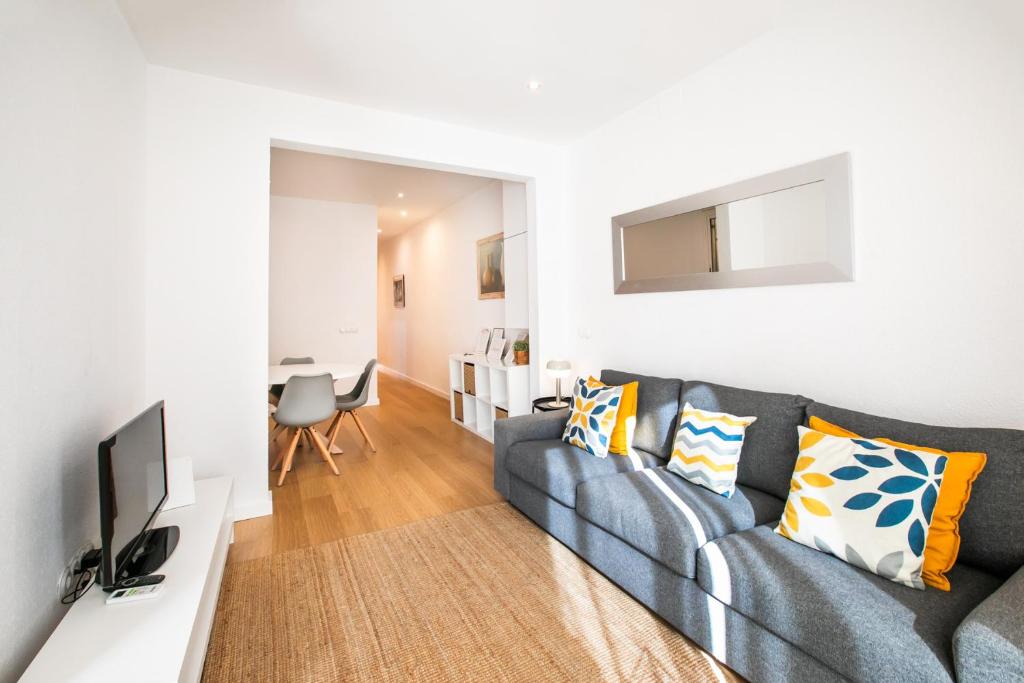 Televízia a/alebo spoločenská miestnosť v ubytovaní 42ara1026 - Spacious apartment in Eixample