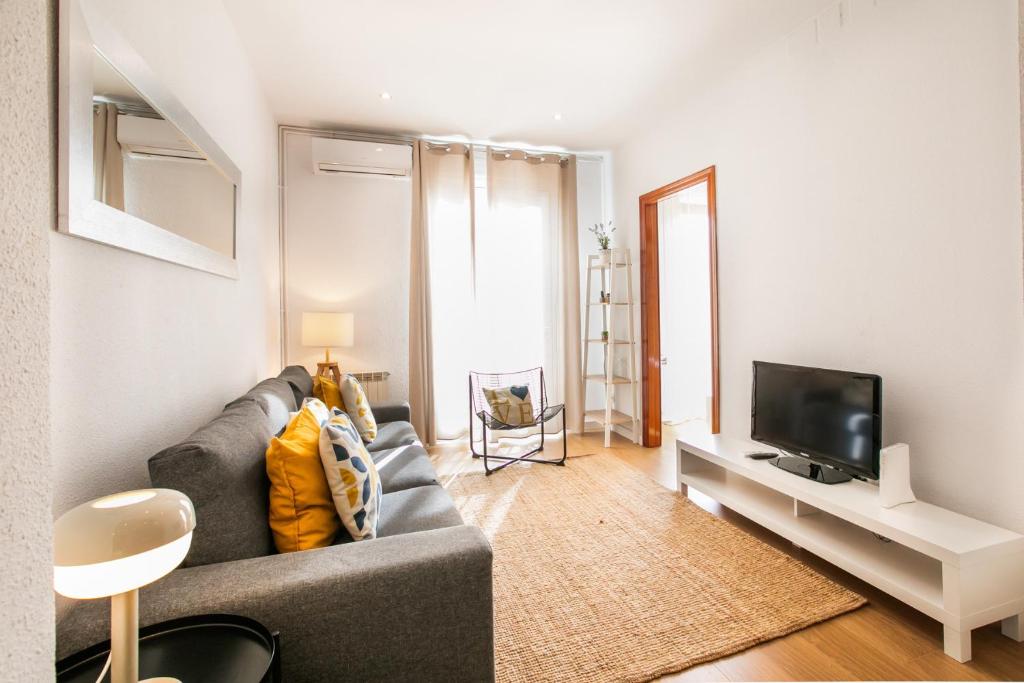 Televízia a/alebo spoločenská miestnosť v ubytovaní 42ara1026 - Spacious apartment in Eixample