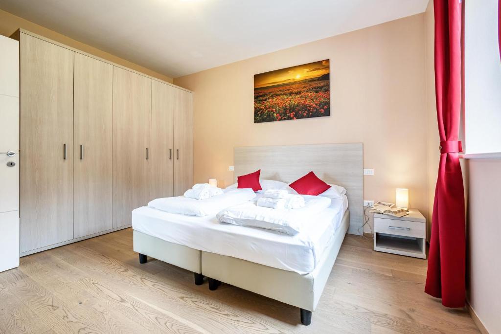 Łóżko lub łóżka w pokoju w obiekcie Residence La Villa Principe