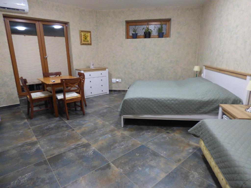 Postel nebo postele na pokoji v ubytování Apartmány za Plotem