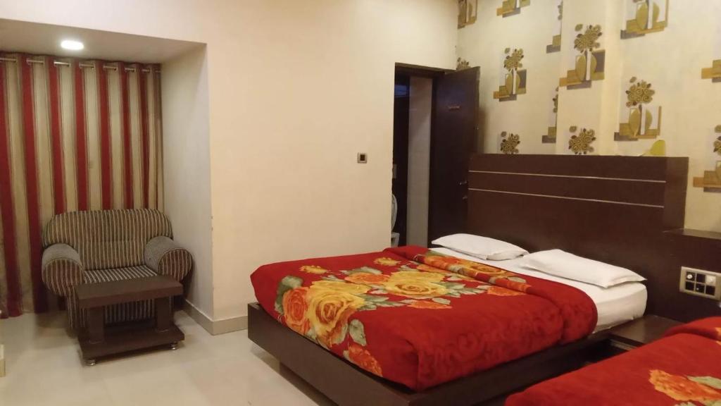 Voodi või voodid majutusasutuse Hotel Royal palace toas